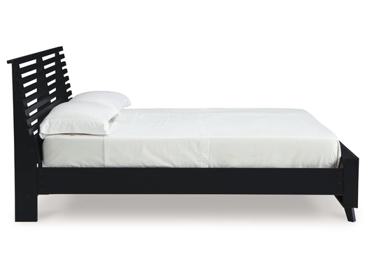 Danziar Slat Panel Bed With Framed Panel Footboard